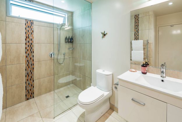 Phoenix Red shower and luxury amenities